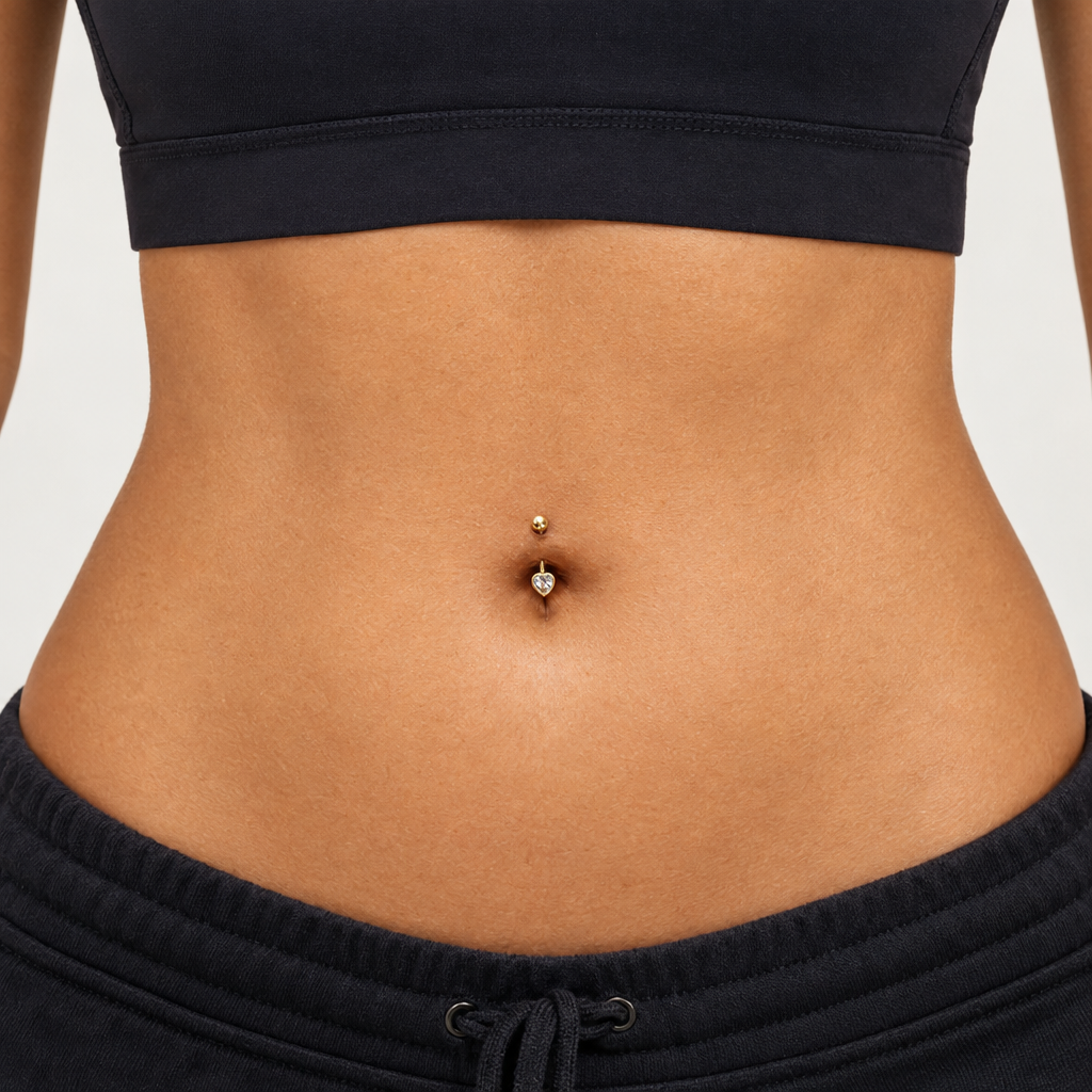 Piercing de Umbigo em Tom Dourado com Pedra em Coração